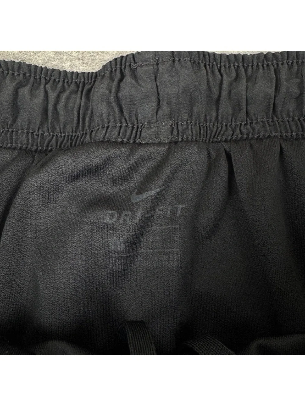Nike Women's Black Athletic Running Shorts with White Swoosh